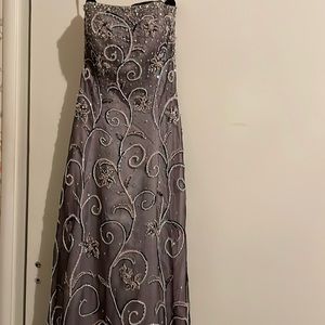 Fabulous couture gown worn once. Jeweled florets. Shoulder wrap included.